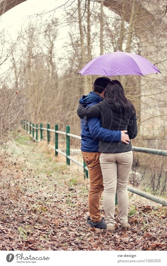 Couple in love hiding under umbrella Wedding couple Caresses Love affair Sunshade Umbrella Matrimony Umbrellas & Shades game of hide-and-seek