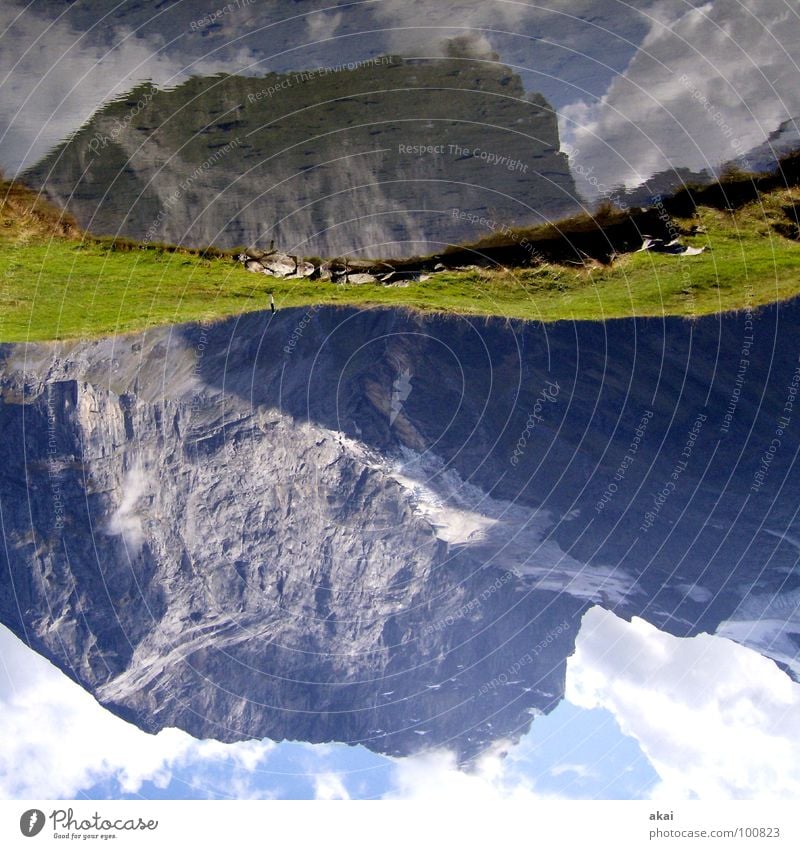 Titlis Play of colours Sky blue Warped Engelberg Switzerland Fürenalp Cable car Reflection Alpine Clouds On the head Go crazy Grass Green Wet Lake Pond Mountain