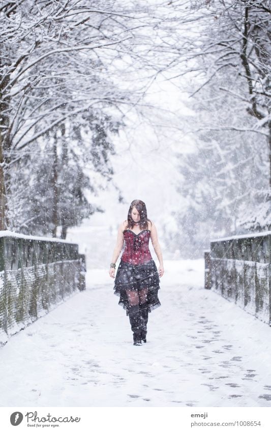 Woman Wearing Winter Fashion In Heavy Snowfall Or Snowstorm Stock