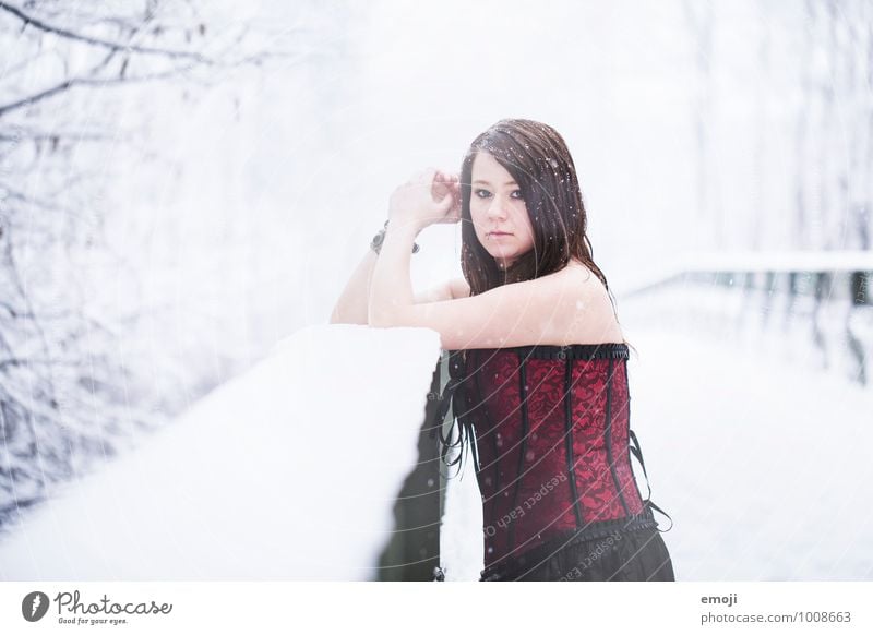 white black red Feminine Young woman Youth (Young adults) 1 Human being 18 - 30 years Adults Environment Nature Winter Snow Snowfall Cold White Colour photo