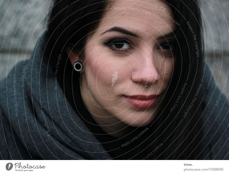 Woman with earring and piercing Feminine Young woman Youth (Young adults) 1 Human being Wall (barrier) Wall (building) Coat Jewellery Piercing Earring