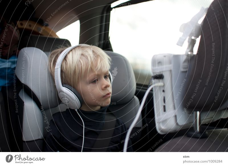 Kid watches cinema in car Television drive-in Car Screen Headphones Child Toddler Boy (child) Family & Relations Infancy Life 1 Human being 1 - 3 years