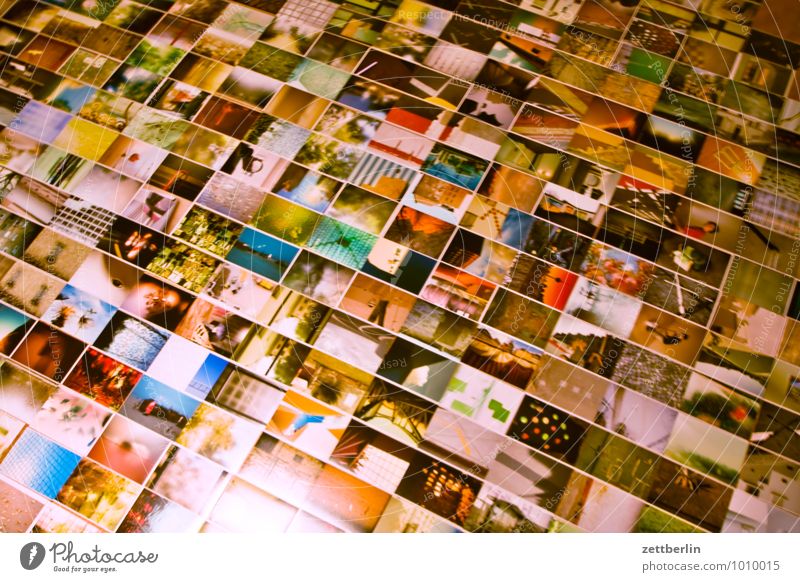 Photos on the floor album Detail Section of image Selection Image Photography Art gallery Crowd of people Many Lie Editorial Office Museum Colour Multicoloured