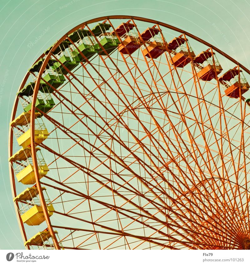ruststalgia Ferris wheel Fairs & Carnivals Debts Shut down Yellow Green Red Multicoloured Steel Iron Aspire Vanishing point Large Might Rotate Circle Turquoise
