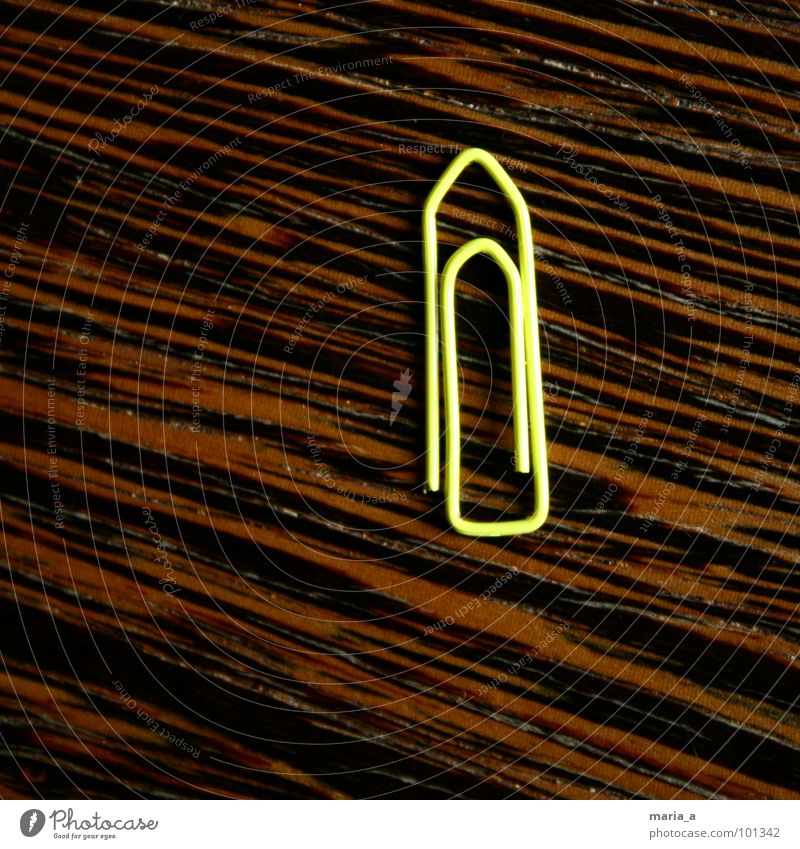 yellow - one of 1000 Paper clip Attachment Yellow Wire Flexible Bend Wood Dark Loneliness Square wood maceration Wood grain Bright isolating single