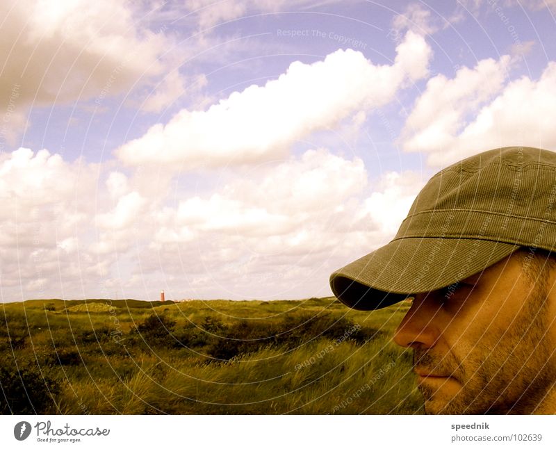 Man with cap [If I Think] Portrait photograph Multicoloured Pallid Yellow White Silhouette Facial hair Cap Baseball cap Clouds Hill Valley Coast Sea water