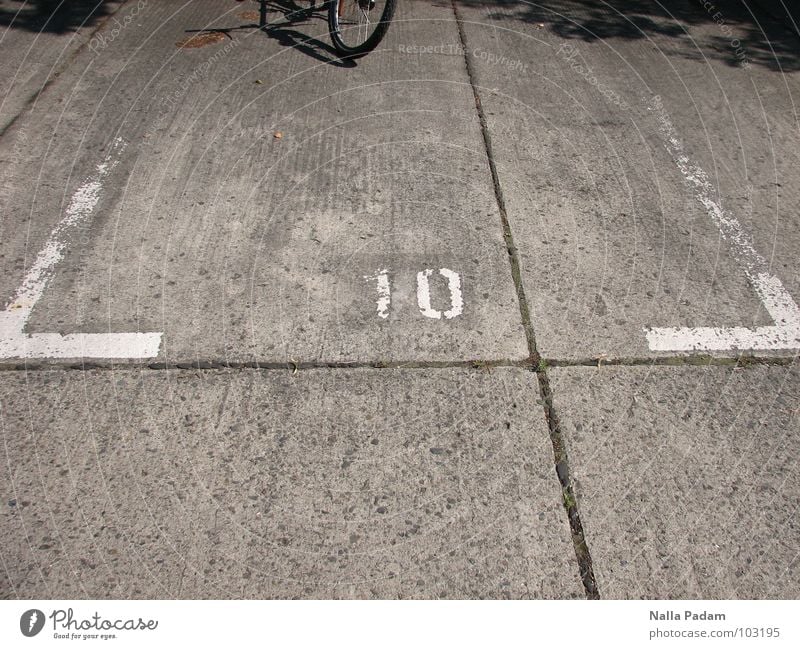 bicycle parking Bicycle Beautiful weather Traffic infrastructure Concrete Digits and numbers Free Gray Refrain Hope 10 parking space Colour photo Exterior shot