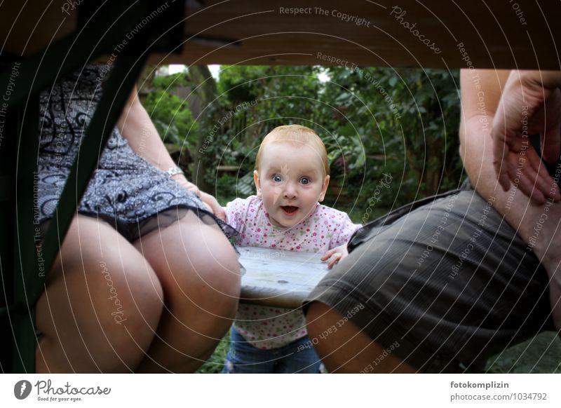 bright curious look of a toddler between mother and father Child Family Parents parental leave Safety (feeling of) Baby Together Joie de vivre (Vitality)