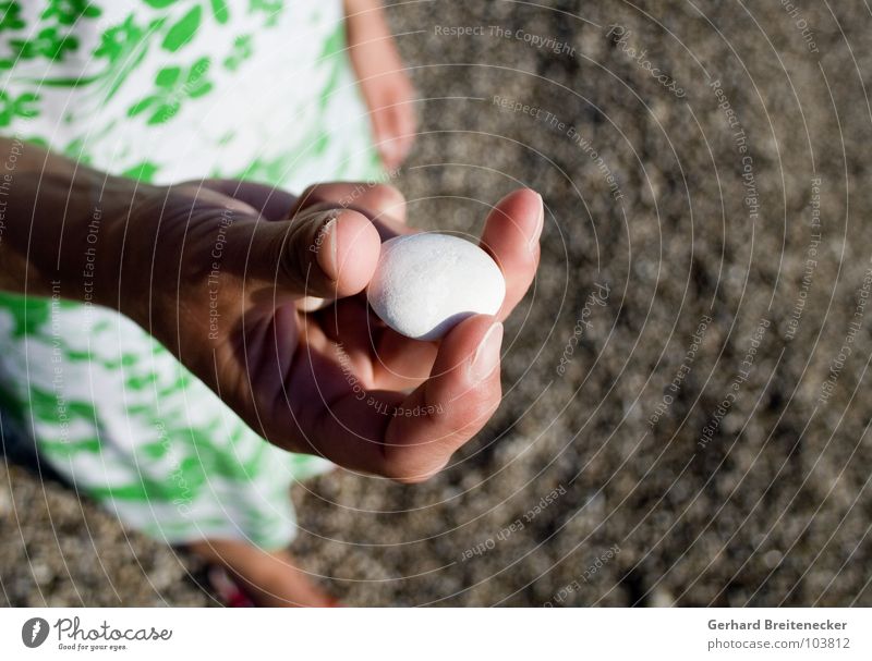 ... find and ... Beach Gravel Woman Dress Stand Find Summer Vacation & Travel Fingers Hand 3 Ocean Stone To hold on Indicate Philosopher's Stone