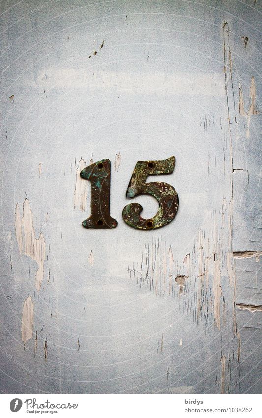 15 Wall (barrier) Wall (building) House number Metal Digits and numbers Old Original Design Identity Weathered Abrasion Colour photo Subdued colour
