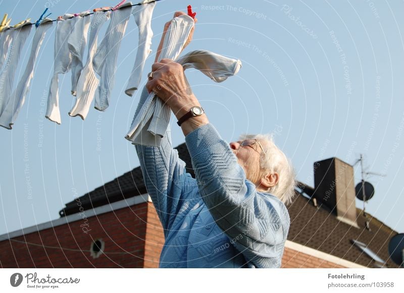 grandma at the laundry Work and employment Grandmother Stockings Old Time Laundry Action Household laundry line background house Senior citizen Female senior