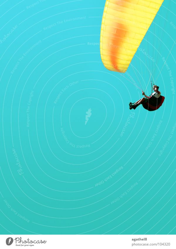 Flying around the corner Paragliding Yellow Glide Cyan Helmet Extreme sports Sky Tall Blue