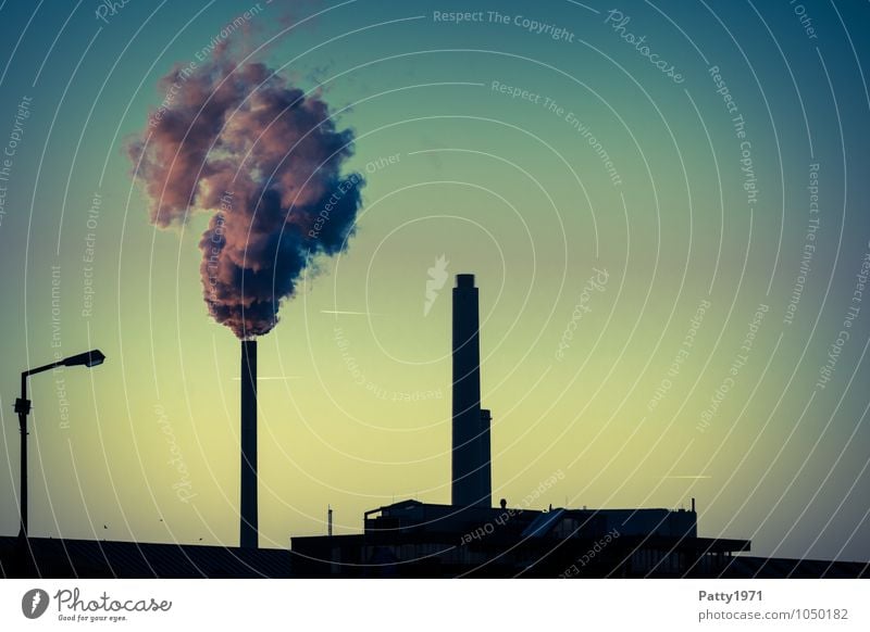 Smoking industrial chimney and combined heat and power plant at dusk Energy industry Coal power station Industry CO2 emission Emission Exhaust gas