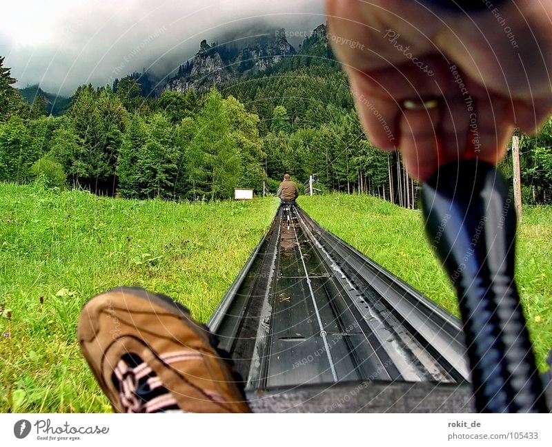 Stick forward! Give rubber II Rubber Summer Toboggan run Sledding Tegelberg Allgäu Steep Footwear Sit Stop Brown Green Cudgel Pushing Tegelbergbahn Speed Slowly