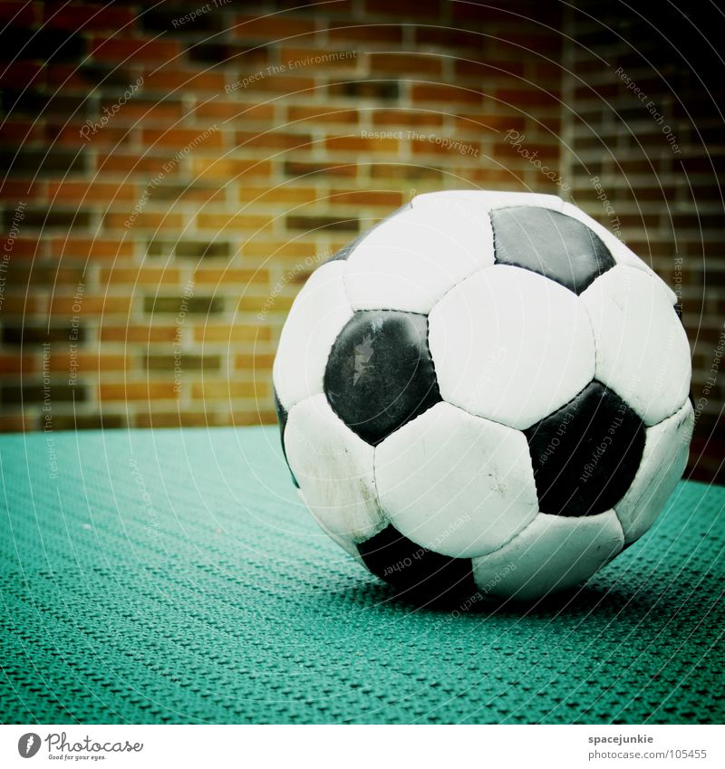 football Playing Black White Wall (building) Leather Leisure and hobbies Round Ball Deserted Brick wall Foot ball 1 Vignetting Glittering Hexagon Lie Sphere