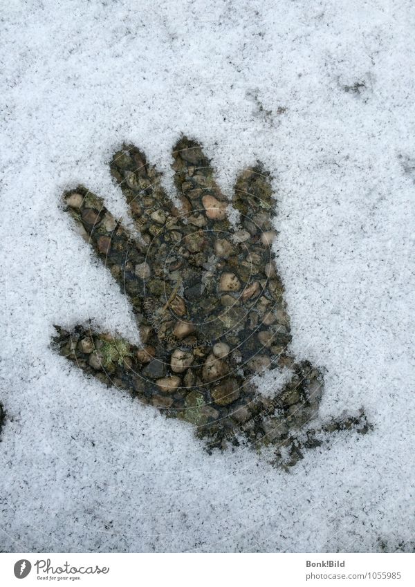 Giving with warm hands Human being Child Hand Elements Earth Snow Warmth Stone Concrete end of winter Thaw warmth of the heart Warm hand Intimacy Touch To talk