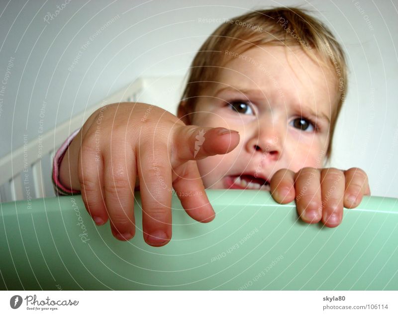 CONTACT Child Toddler girl Milk teeth by hand Playing Amazed Face Hair and hairstyles To hold on Indicate Forefinger wish Face of a child Disappointment