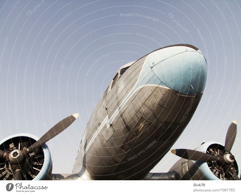 Historical aircraft Logistics Technology Aviation Cloudless sky Sunlight Summer Beautiful weather Transport Means of transport Passenger traffic Airplane