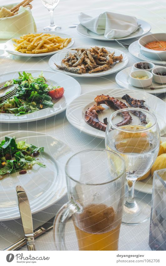 Table in greek restaurant. Salat and fish Cheese Bread Breakfast Lunch Dinner Plate Ocean Restaurant Delicious Green White Greek food Greece Salad healthy Dish