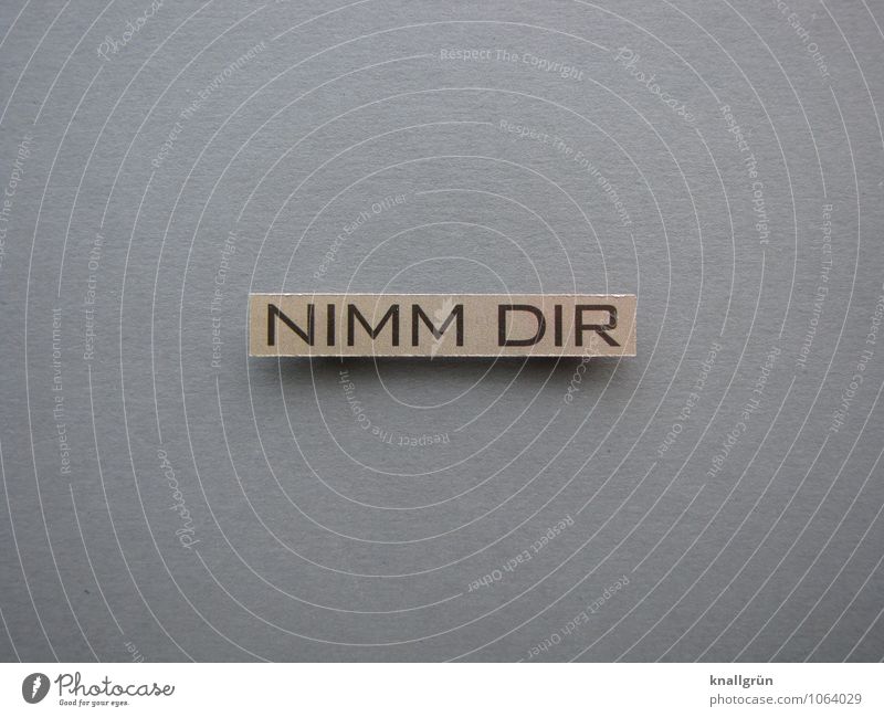 NIMM DIR Characters Signs and labeling Communicate Sharp-edged Brown Gray Black Emotions Hospitality Friendliness share Give Demand Colour photo Studio shot
