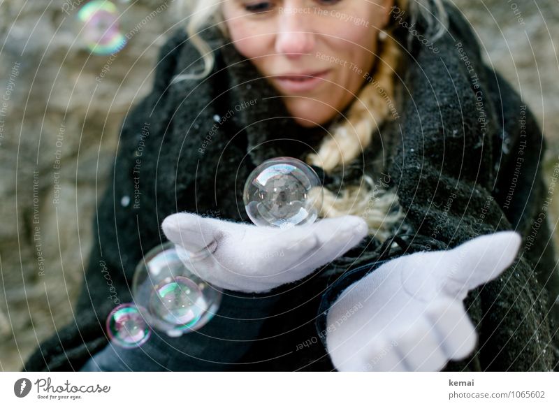 Woman with bubbles on hand in winter Joy Playing Soap bubble Winter Human being Feminine Adults Life Hand 1 Cloth Blanket Cape Gloves Blonde Long-haired Braids