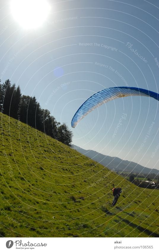 slope landing Paragliding Paraglider Play of colours Sky blue Romance Sunlight Sunbeam Sunset Departure Homey Emotions Puppy love Clearance for take-off