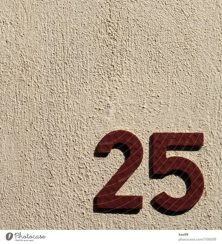 25 Digits and numbers House (Residential Structure) Wall (building) Wall (barrier) House number Red Background picture Mathematics 7 Reddish white Home country