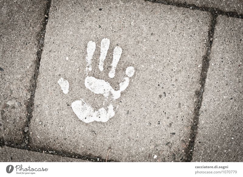 It awakes at midnight. Street Sidewalk off paved path Concrete Sign Hand handprint Threat Dark Simple Creepy Under Gray White Death Fear Dangerous Bizarre