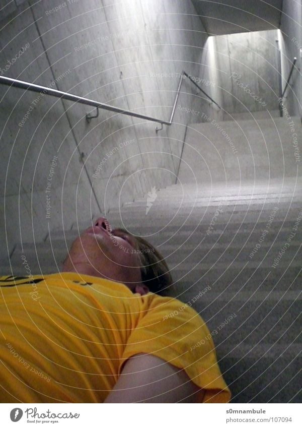 Man in space Downward Cold Perspective Vanishing point Yellow Discern Concrete Diagonal Opposite Interior shot Gray Modern Stairs eight-level architecture