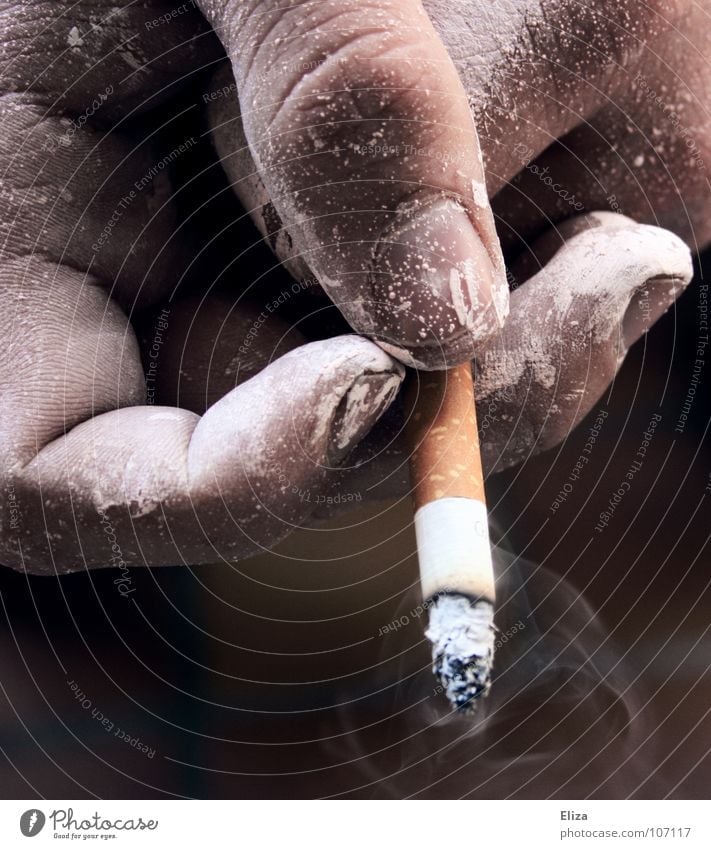 A hand of a smoker with a burning cigarette and smoke, sprinkled with white paint Smoking Human being Painter Masculine Man Adults Hand Fingers Vice