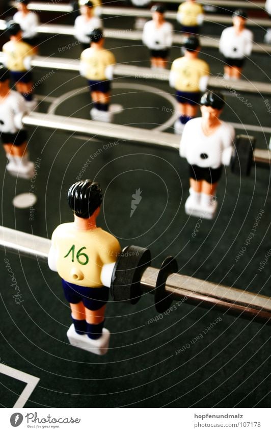 off Table Break Fraud Kick off Sports Playing Individual Soccer player 16 Table soccer Rod Shallow depth of field Colour photo Rear view Side by side