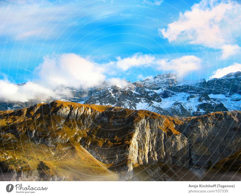 ...the world stands still Clouds Calm Infinity Switzerland Large White Fluffy Remote Alpine pasture Cold Exterior shot Mountain Sky Far-off places Nature