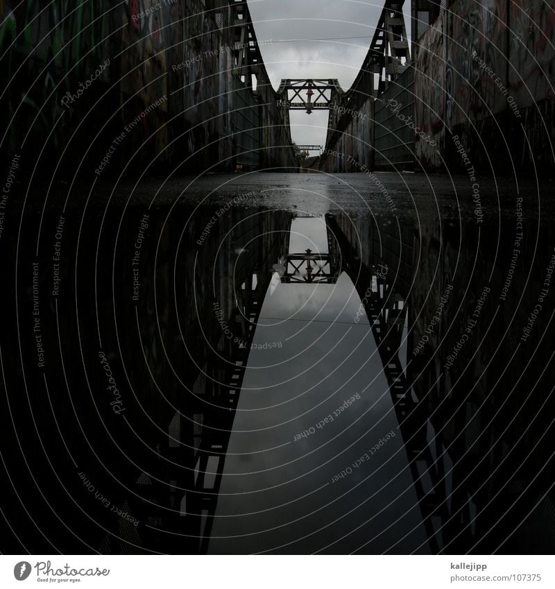 X Suspension bridge Construction Puddle Reflection Bridge Mirror image Water reflection Water puddle Surface of water Silhouette Central perspective Dark
