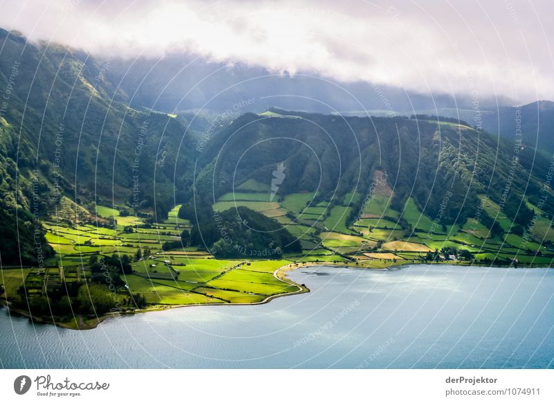 Lagoa do Fogo with spotlight Environment Nature Landscape Plant Summer Beautiful weather Bad weather Foliage plant Agricultural crop Wild plant Meadow Field