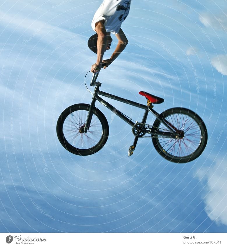 backflip Motorcyclist Driver BMX bike Bicycle Salto Back somersault Sky blue Clouds Pedal Flying Hover Handstand Cap Down-to-earth Aloof To hold on To fall