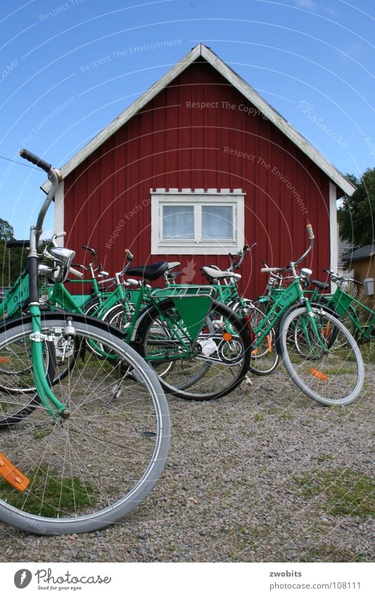 Hej cyklar! Bicycle Wooden house House (Residential Structure) Red Green Bike Rental Shop Playing Leisure and hobbies Transport Swede Sky Blue Wait rental