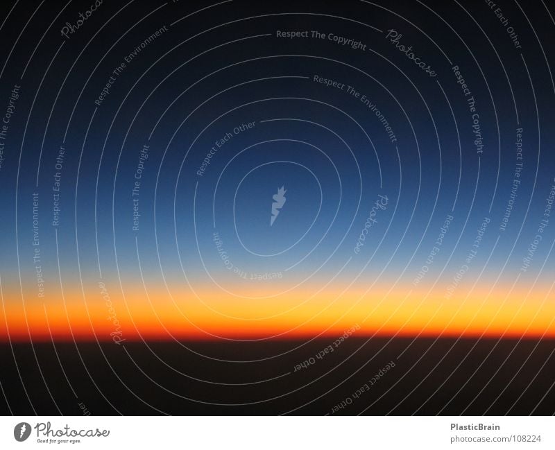 glowing horizon Sunset Airplane Bird's-eye view Horizon Celestial bodies and the universe Sky Aviation