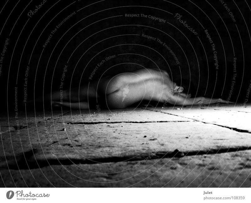 In the vaulted cellar Naked Man Masculine Fellow Nude photography Floor covering Back Perspective Guy Stone floor Dark background Bottom Rear view Lie