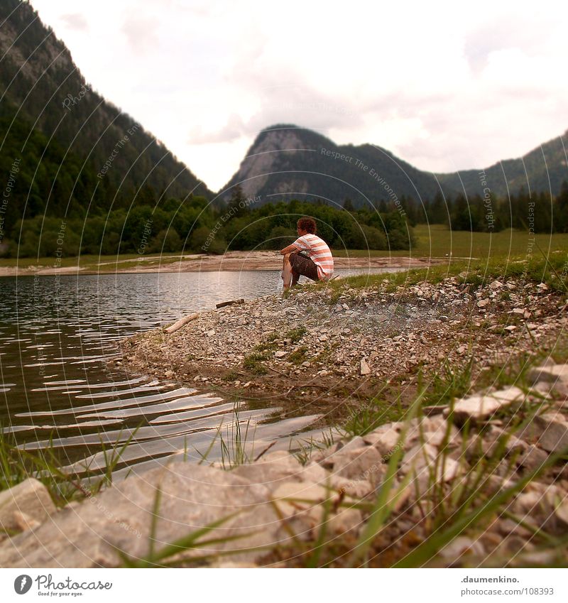 Siddharta Man Lake Pond Waves Grass Blade of grass Meadow Forest Tree Hill Calm Barefoot Hiking Summer Thought Think Philosophy Deities Contentment Peace