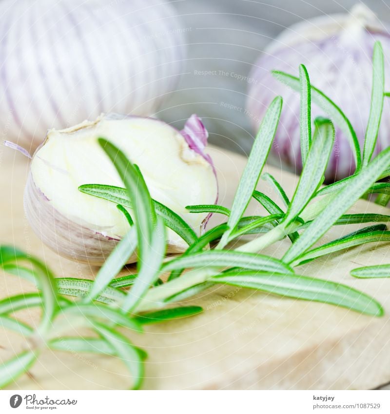 Garlic and rosemary Clove of garlic Rosemary Aromatic Herbs Fresh Herbs and spices Pepper Near Violet Toes Ingredients Kitchen Wood Table Wooden board