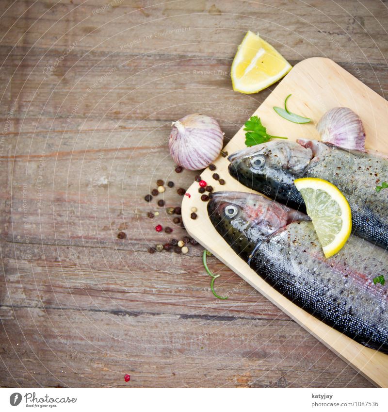 trout Trout Fish Lemon Barbecue (apparatus) Barbecue (event) Raw Rosemary Garlic Clove of garlic Healthy Eating Dish Food photograph Nutrition Protein