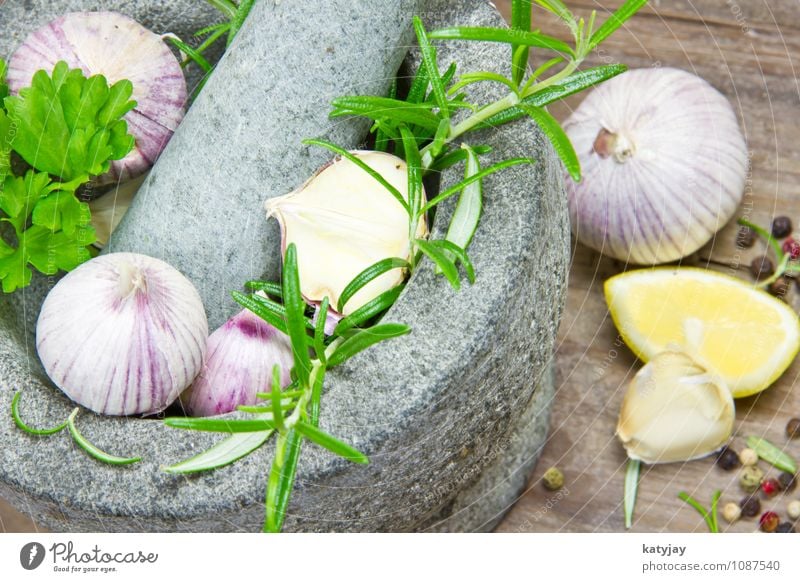 Herbs in a mortar Garlic Clove of garlic Rosemary Mortar Cooking Lemon Aromatic Food Healthy Eating Dish Food photograph Fresh Herbs and spices Green Pepper