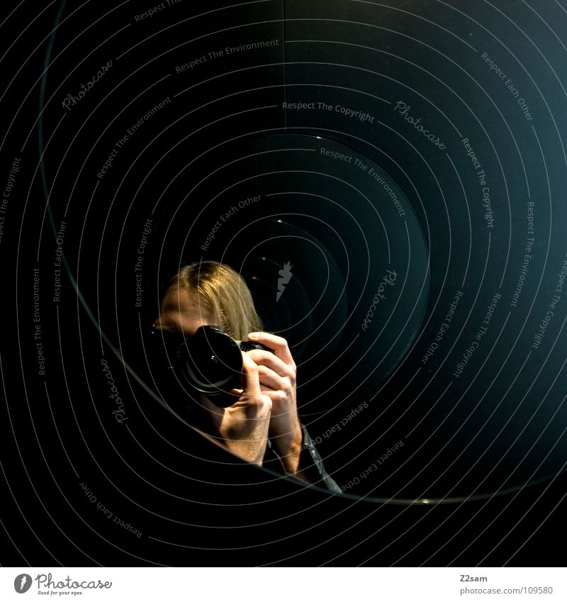 The Photographer Photography Take a photo Mirror Self portrait Circle Mirror image Reflection Frontal Man Blonde Hand To hold on Semicircle Blue tint Black Dark