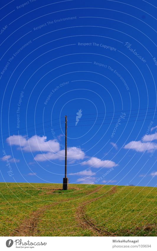 power pole Electricity pylon Field Footpath Clouds Loneliness Curved Transmission lines Summer Sky Pole Energy industry Tractor track