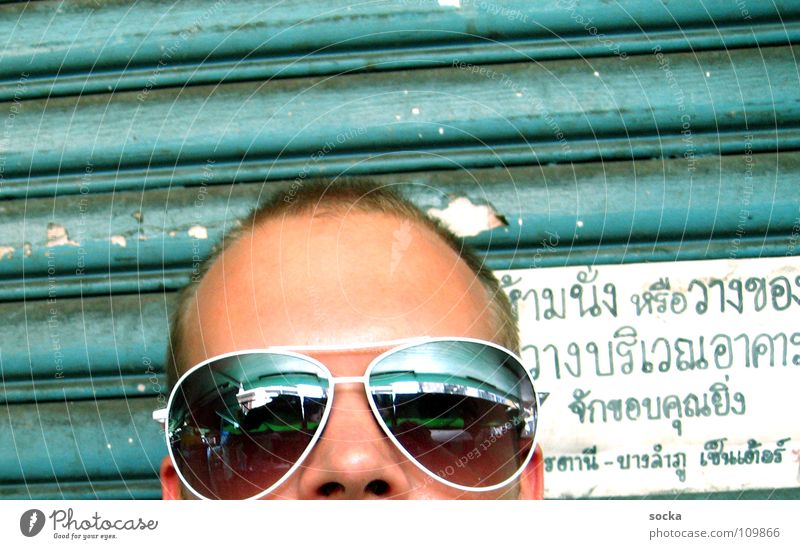 Sunglasses @ thailand Man Mirror Garage Turquoise Green Thailand Bangkok Short haircut Vacation & Travel Letters (alphabet) Characters Signs and labeling Head