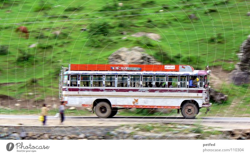 ... from Srinagar to Gulmarg ... India Jammu, Ladakh, Kashmir Green White Driving Vacation & Travel Street Logistics Bus Human being Mountain Orange Boy (child)