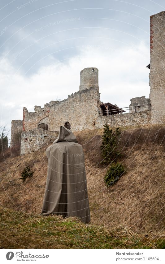 Out of time. Arrival. Human being Androgynous Nature Landscape Grass Meadow Castle Ruin Manmade structures Architecture Tourist Attraction Landmark Coat Wait