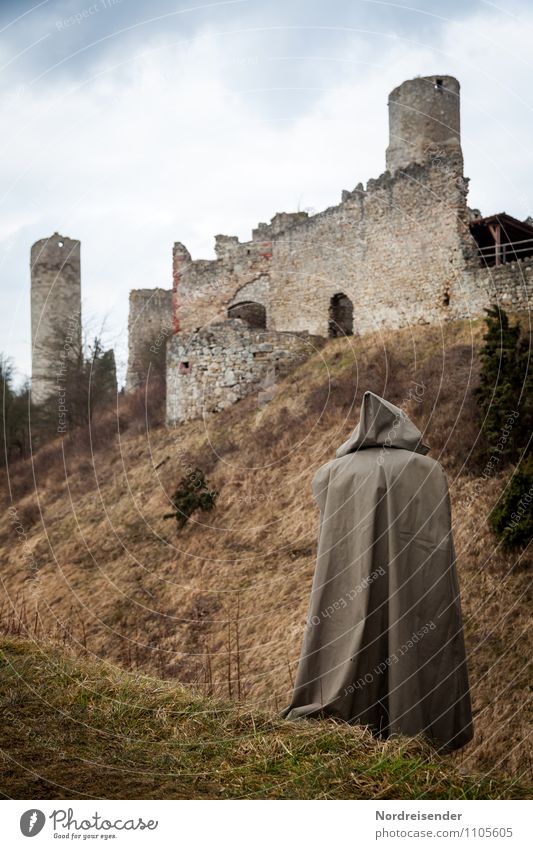 monk Senses Calm Human being 1 Culture Clouds Grass Hill Castle Ruin Architecture Tourist Attraction Landmark Monument Coat Observe Think Dark Broken Town