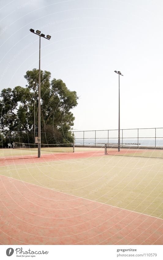 tennis court on cyprus Cyprus Tennis court Ocean Floodlight Ball sports limassol sea
