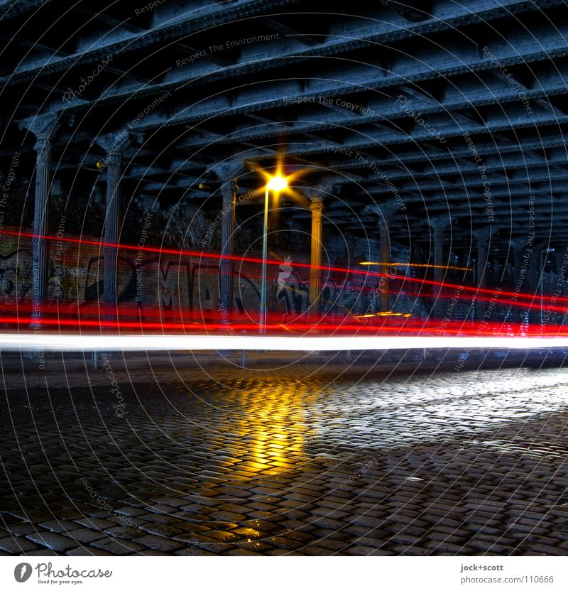 Velocitas in the tunnel Tunnel Steel carrier Traffic infrastructure Street Cobblestones Street lighting Tracer path Graffiti Dark Historic Speed Moody Mobility